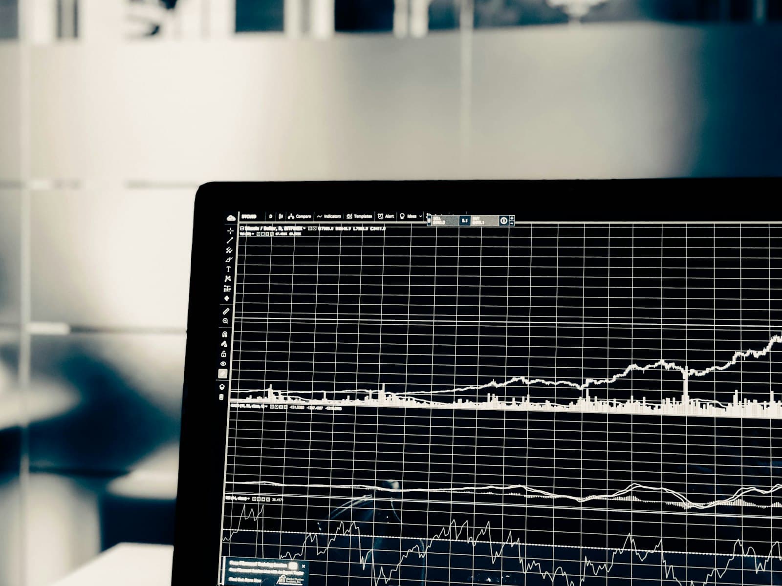 Analytical charts displayed across a monitor