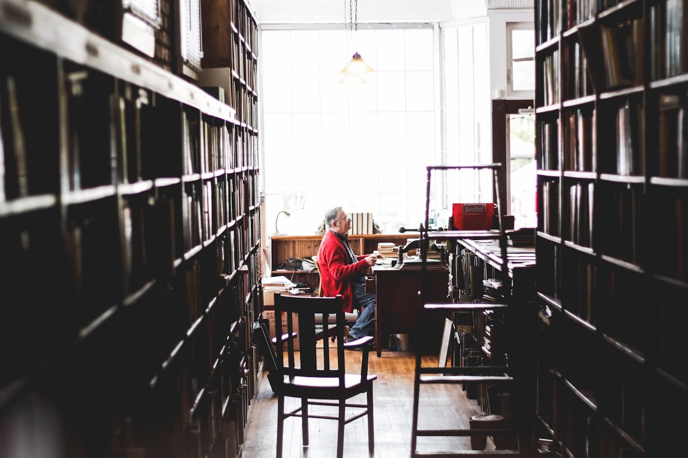 A researcher reading in a quiet library