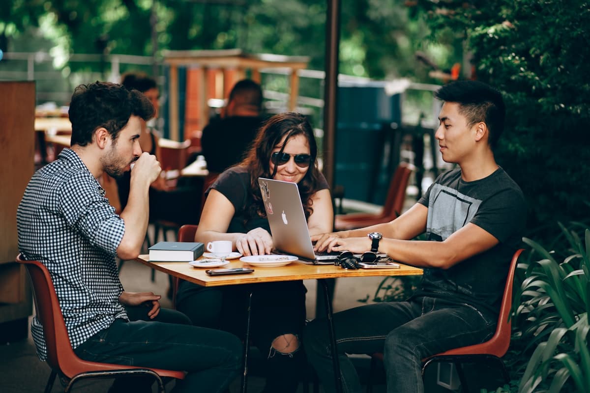 Three researchers in discussion
